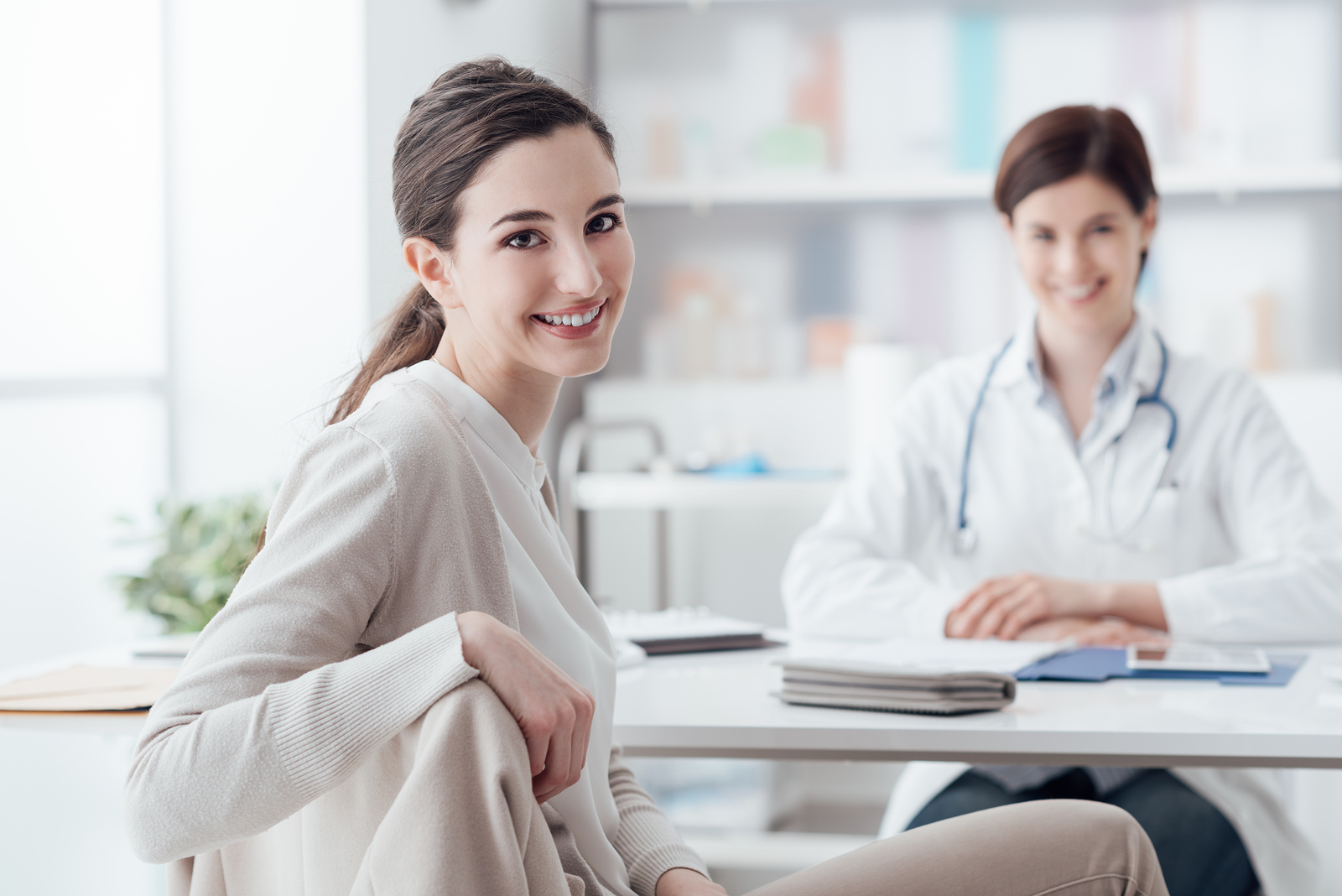 Smiling patient receiving a medical consultation