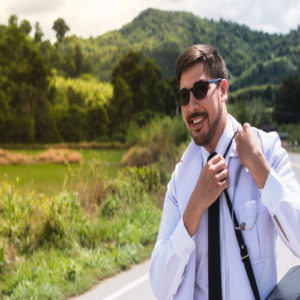 Doctor is standing at rural road. Community Health In Remote Areas 