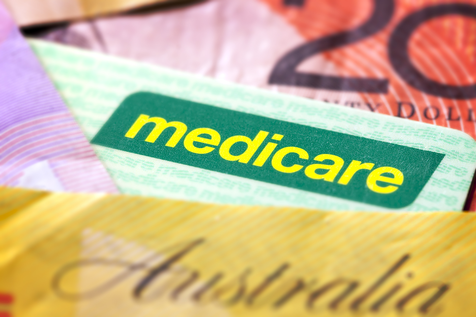 Australian Medicare card and money.